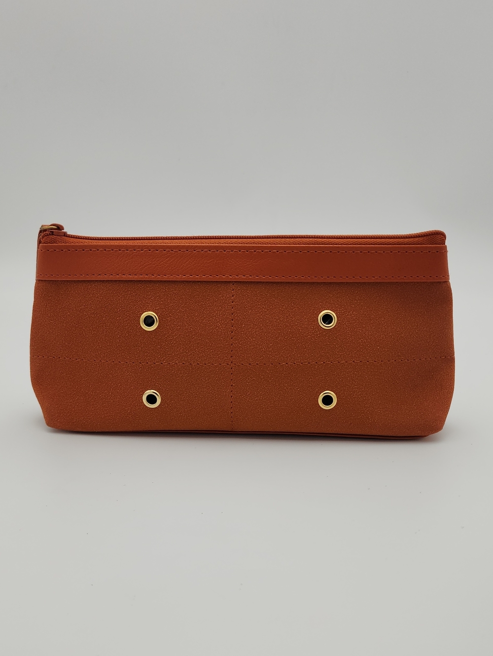 Estee Lauder Sleek Burnt Orange Zip Pouch with Gold Grommets